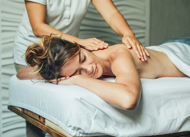 Woman receiving a massage at ESPACIO Spa.