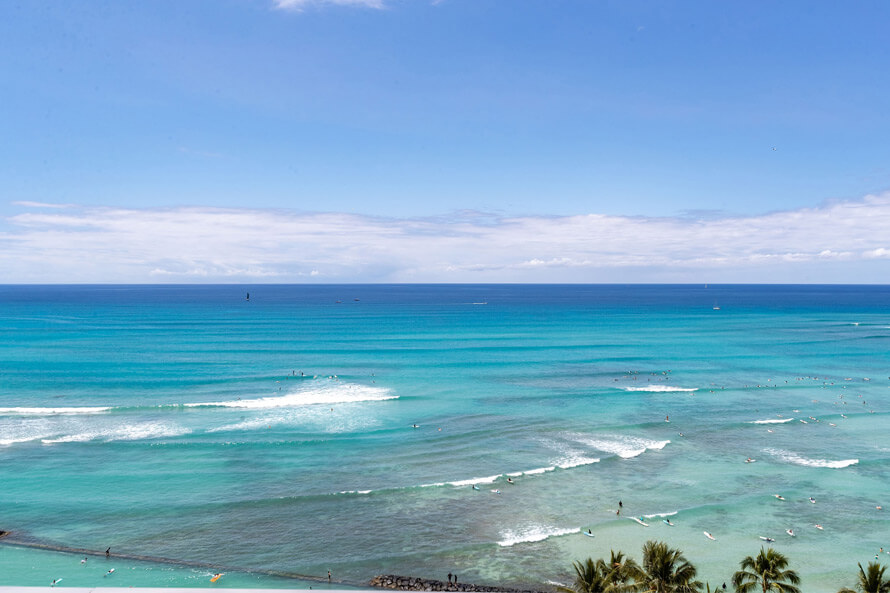 The rooftop deck overlooks Waikiki Beach and into the horizon.