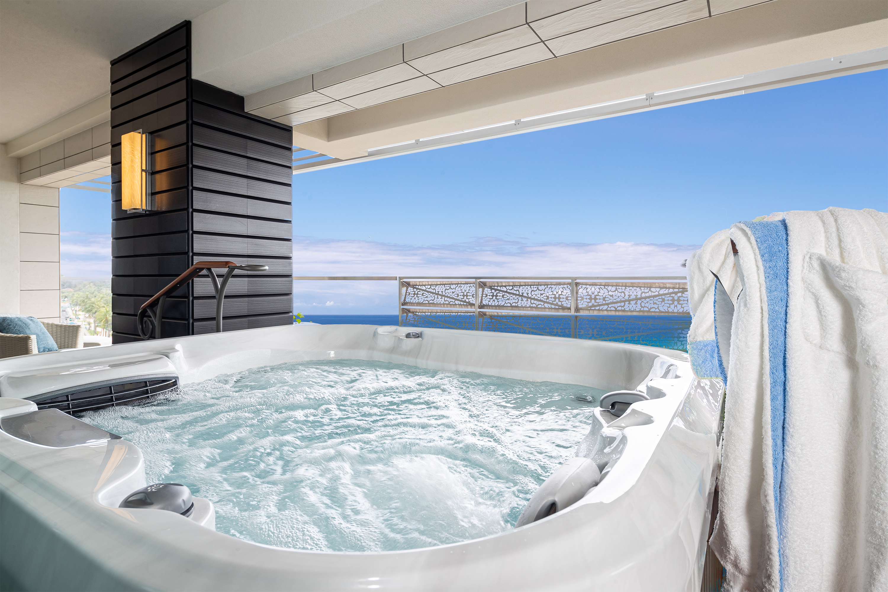 Jacuzzi on balcony with ocen views