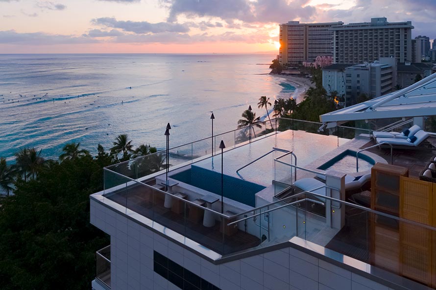 ESPACIO rooftop deck at sunset overlooking Waikiki Beach