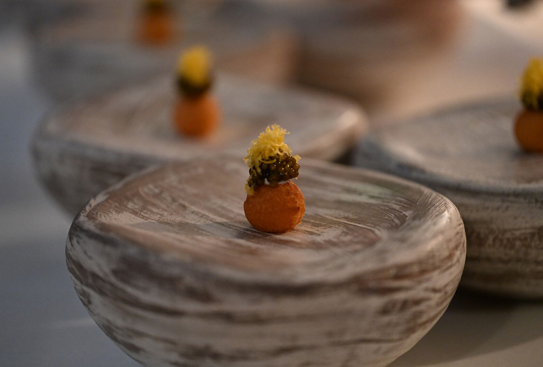 Sasanian Osetra Caviar, andagi. crème fraîche. cured yolk.