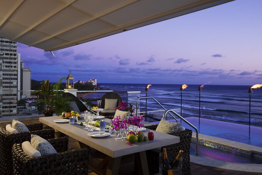 Infinity pool dinner setting.