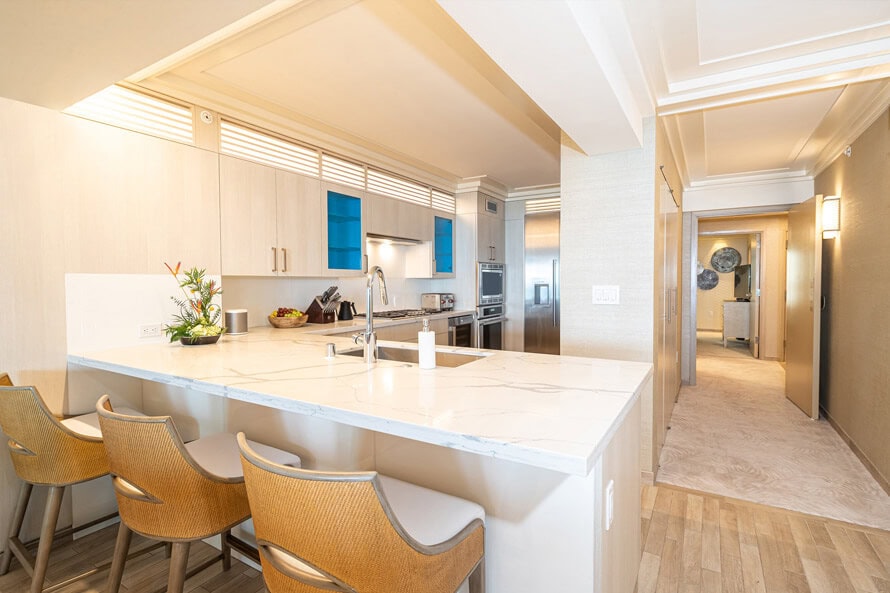 Full kitchen with Thermador and Miele appliances, rice cooker, and wine cellar.