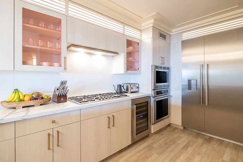 Kitchen with stove, oven, refrigerator.