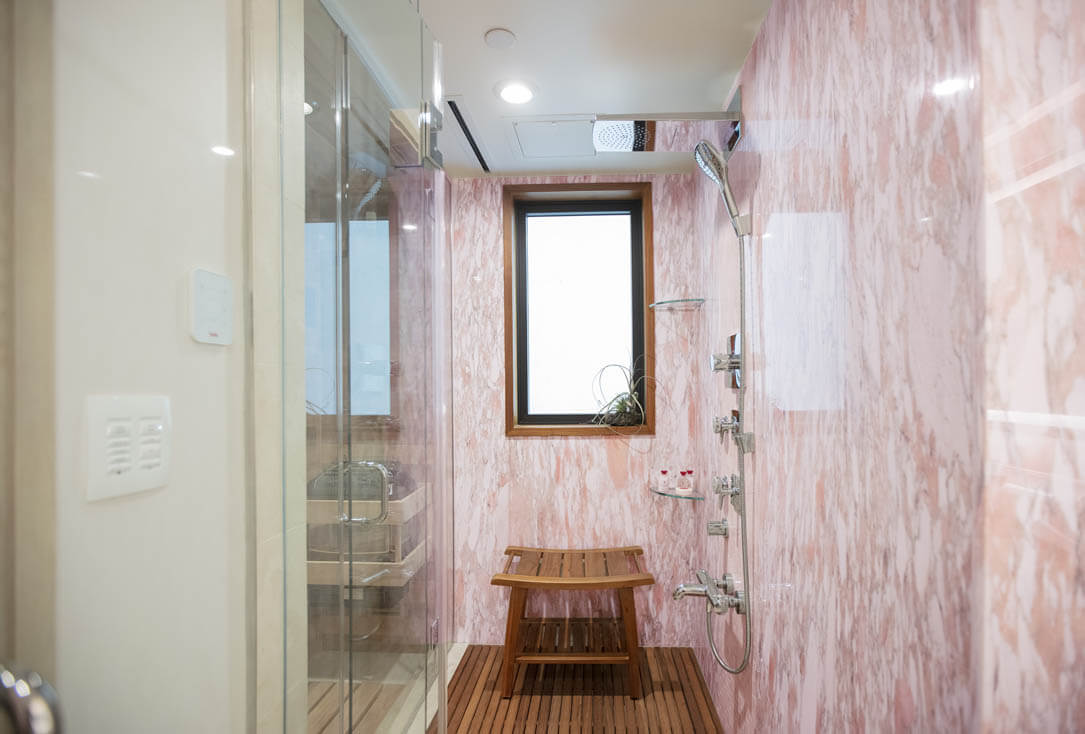 Marble shower and sauna.