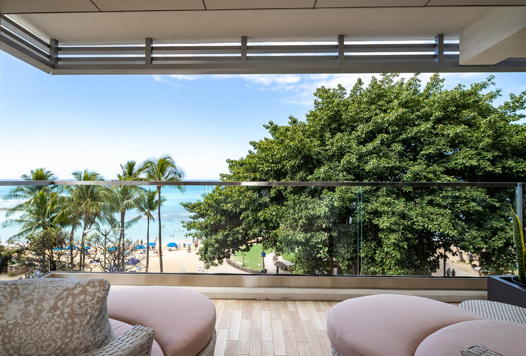 Furnished balcony with beachfront views.